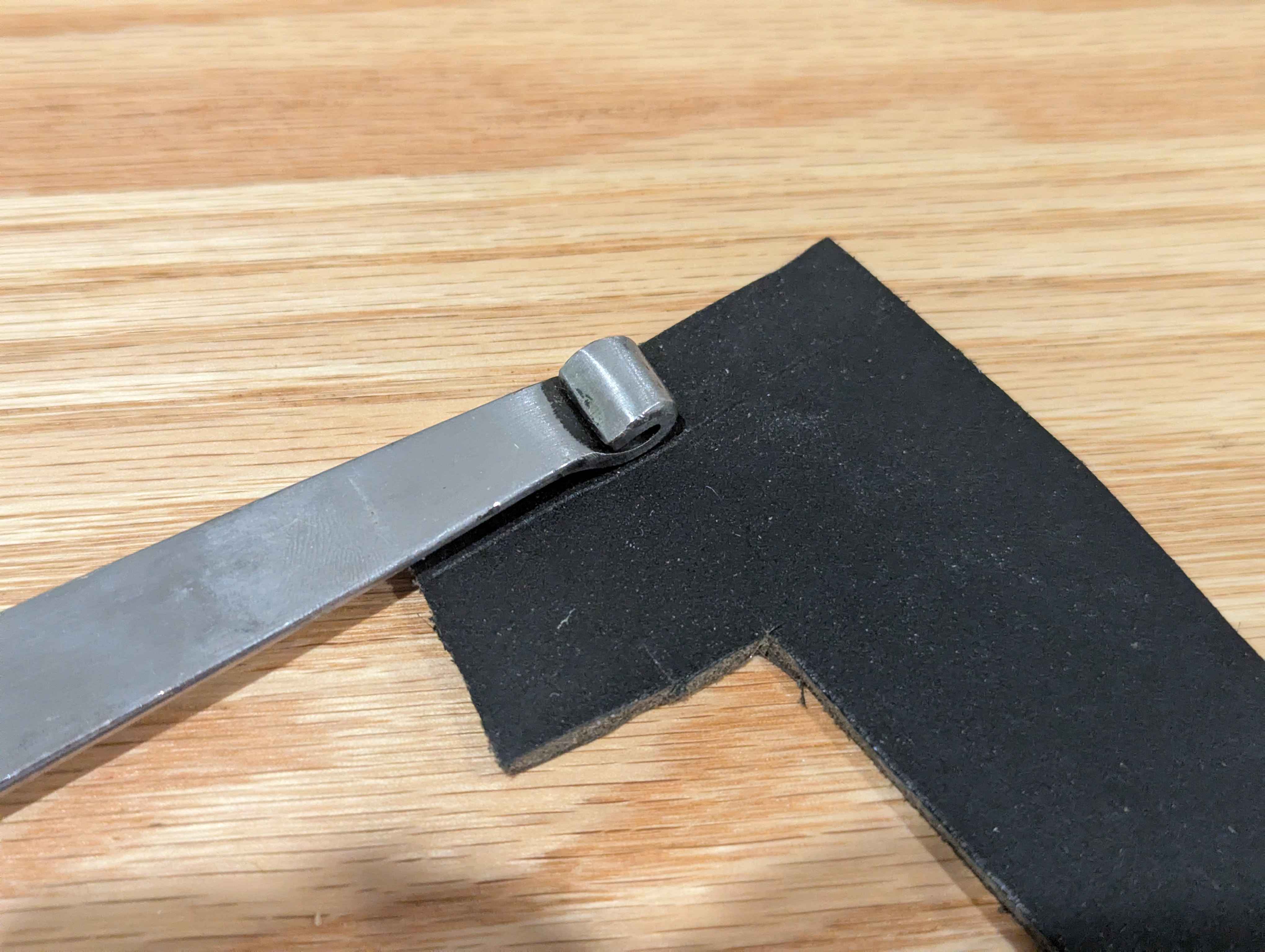 Scoring the leather in preparation for cutting